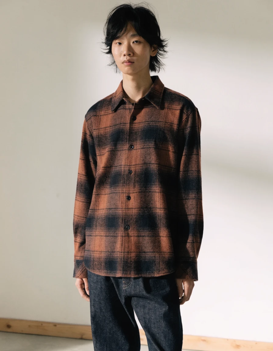 Flannel Shirt in rust plaid, front.